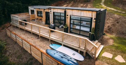 Shipping Container Home With 4 Garage Doors!