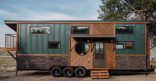 This Rustic Tiny House Has a Spacious Interior and a Balcony Up Top