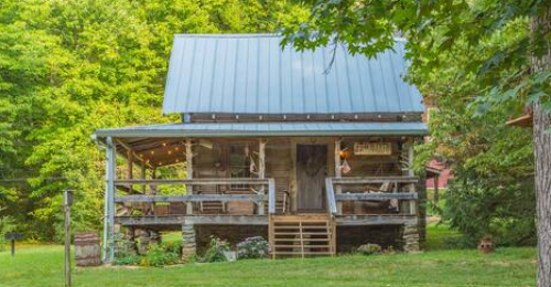 Step Back in Time When You Stay in This Quaint 1890's Log Cabin