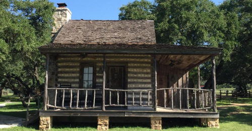 People Love This Little Rustic Log Cabin With Porch